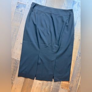 Ann Taylor “Tall” slim, black, pencil skirt - hits below the knee.